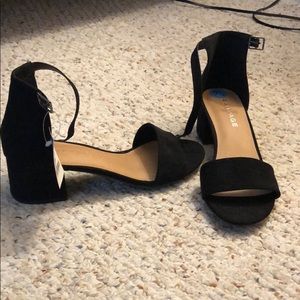 Black, 1 1/2 inch heel sandals.